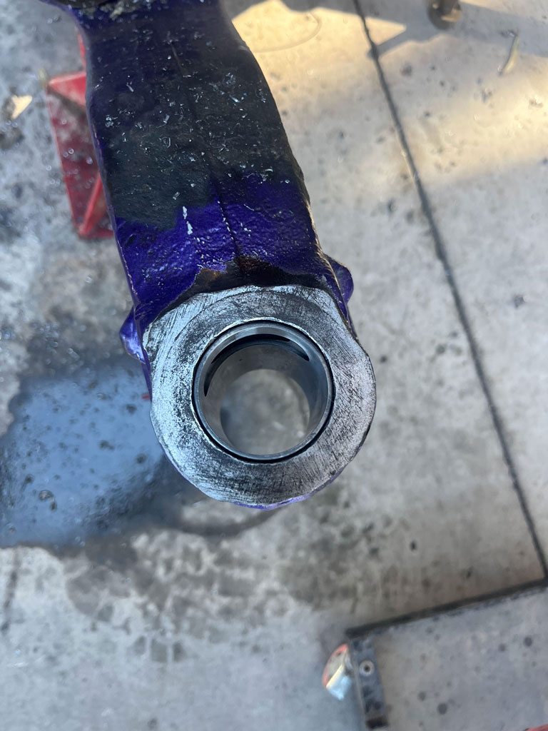 Heavy-duty truck undergoing axle eye repair at AZ Axle Medic.