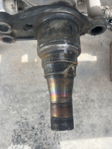 Home 6 Heavy-duty truck undergoing spindle repair at AZ Axle Medic.