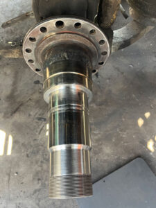 Home 9 Heavy-duty truck undergoing spindle repair at AZ Axle Medic.